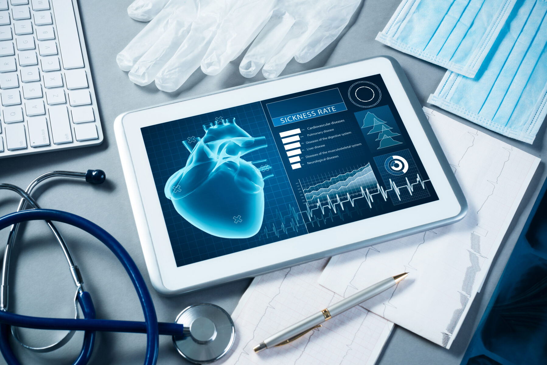 table with White tablet and doctor gloves, mask, tools