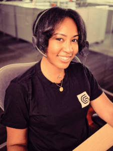 woman guide wearing headset smiling at camera