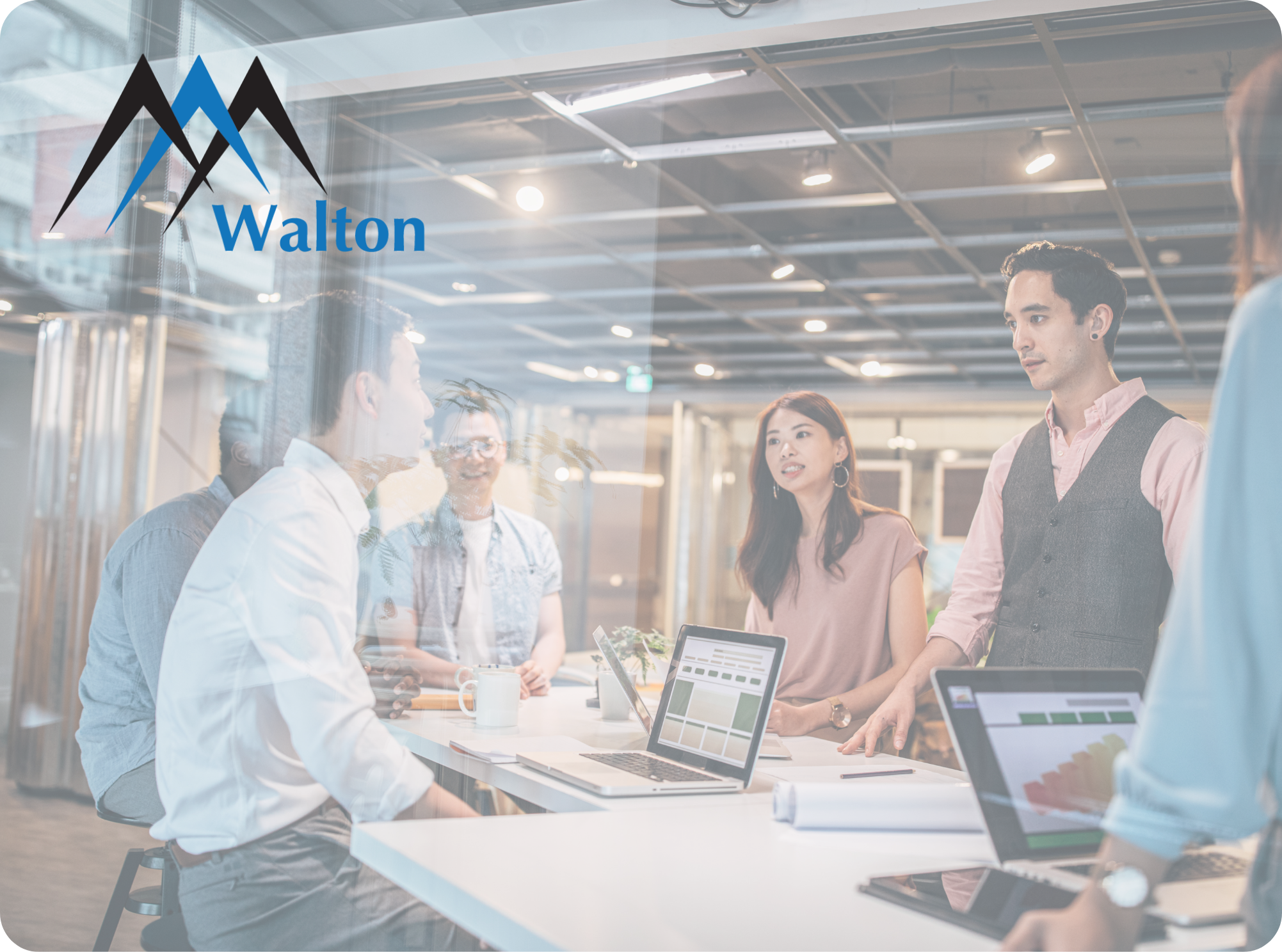 Stock image of a group of professionals at a table.